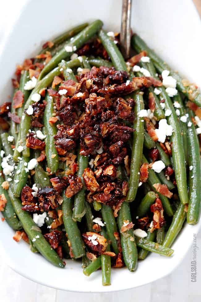 Dijon Maple Green Beans with Caramelized Pecans, Bacon and Feta | these aren't your grandmother's green beans! Tangy, salty, sweet, crunchy, crispy, creamy AKA, “the best green beans ever.” Not just for Thanksgiving but a year round company pleasing, delicious side.