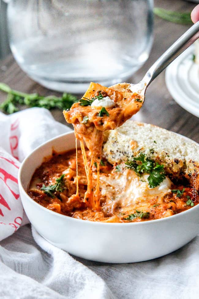 Easy One Pot Lasagna Soup tastes just like lasagna without all the layering or dishes! Simply brown your beef and dump in all ingredients and simmer away!